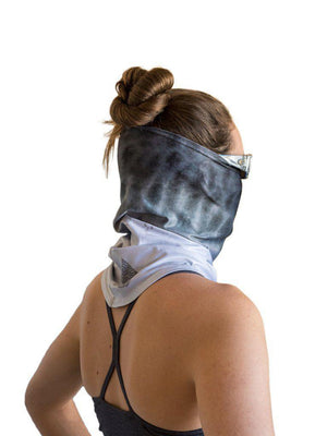 Woman wearin a Waterlust sun mask protecting her face