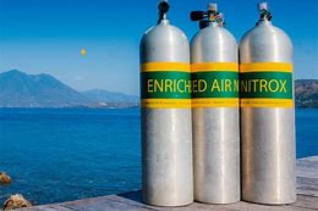 3 Enriched air tanks on a jetty by a lake