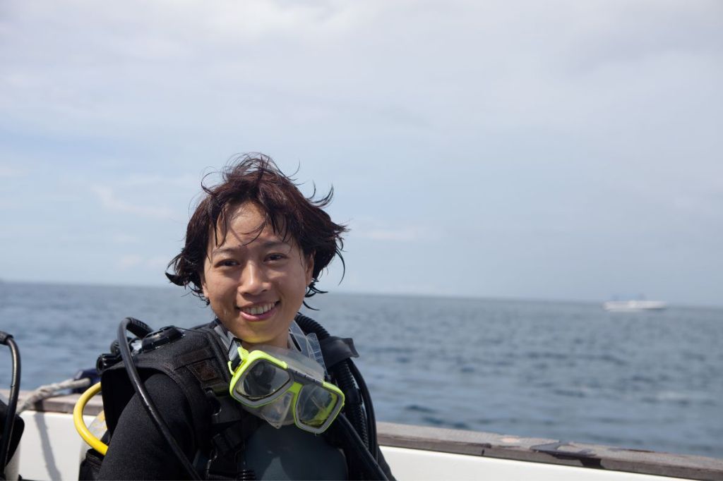 A Scuba Woman on a boat
Empty Nest Diver